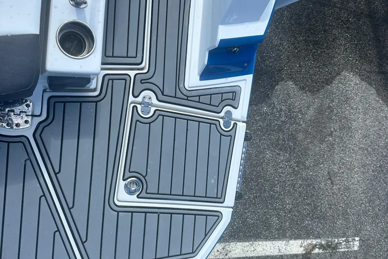 Slide: The Image of 2020 Monterey M4 boat deck with cup holder and textured flooring. - 9