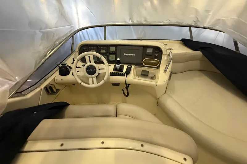 Slide: The Image of 2008 Azimut 55 EVOLUTION yacht cockpit with steering wheel and navigation equipment. - 11