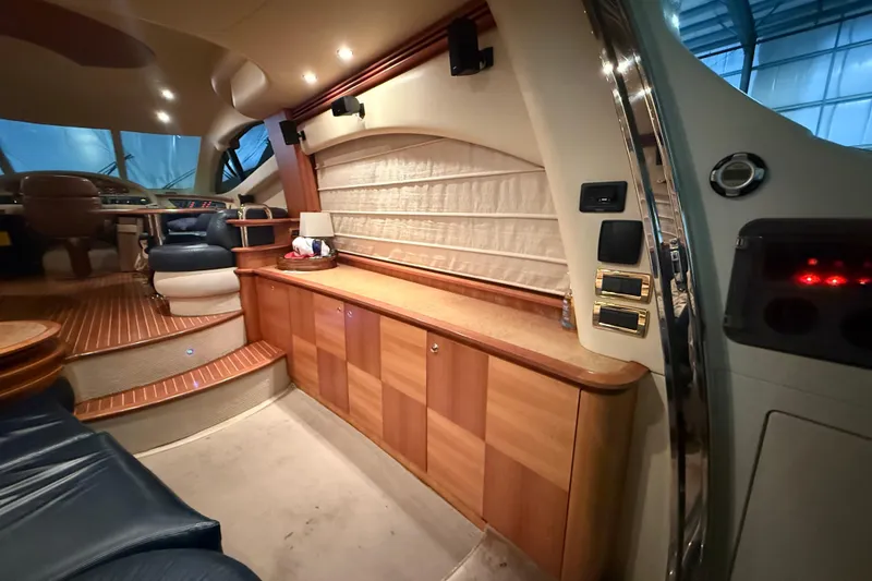 Slide: The Image of Luxurious interior of a 2008 Azimut 55 EVOLUTION yacht with elegant wood finishes. - 15