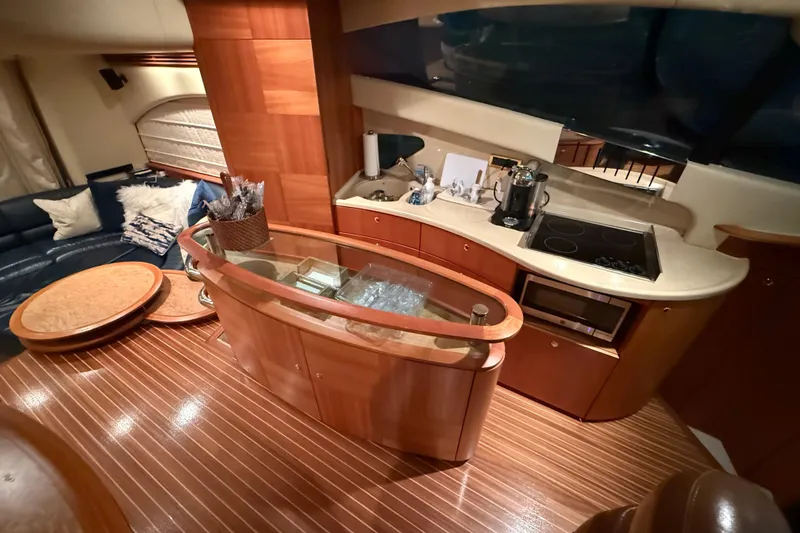 Slide: The Image of Luxurious interior of 2008 Azimut 55 EVOLUTION yacht with modern kitchen and seating area. - 17