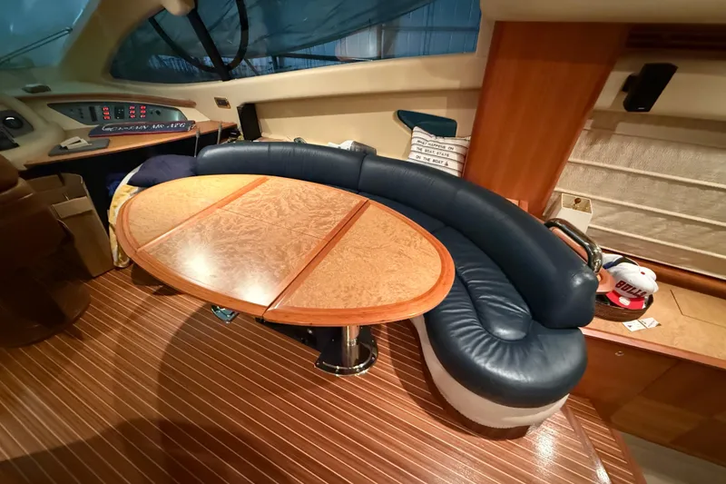 Slide: The Image of Luxurious interior of 2008 Azimut 55 EVOLUTION yacht with elegant seating and wooden table. - 22