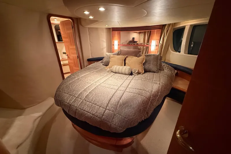 Slide: The Image of Luxurious bedroom interior of 2008 Azimut 55 EVOLUTION yacht with elegant bedding. - 27