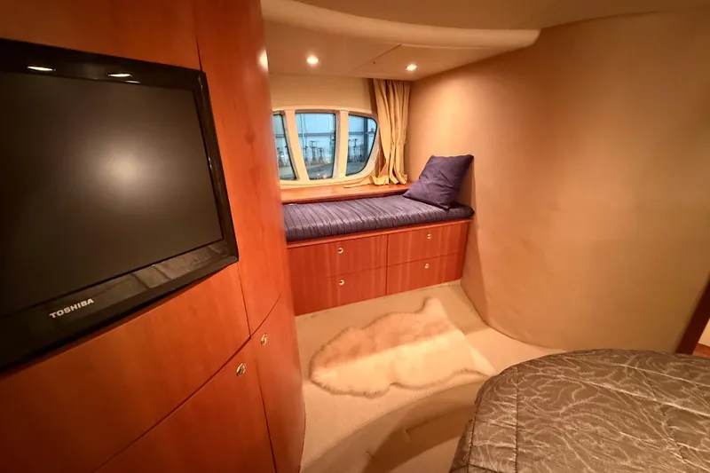 Slide: The Image of Luxurious interior of 2008 Azimut 55 EVOLUTION yacht with cozy seating and TV. - 32