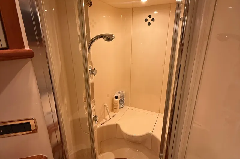 Slide: The Image of Luxurious shower area in 2008 Azimut 55 EVOLUTION yacht, featuring modern fixtures and elegant design. - 35
