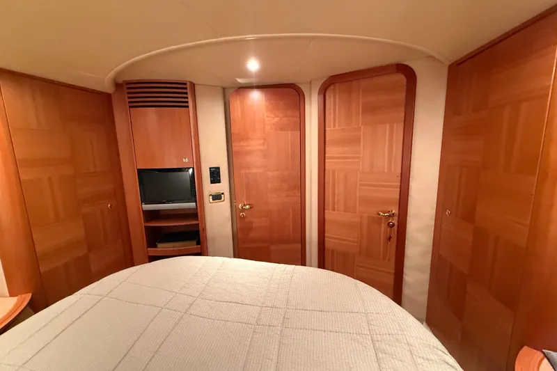 Slide: The Image of Luxurious cabin interior of 2008 Azimut 55 EVOLUTION yacht with wood paneling. - 37