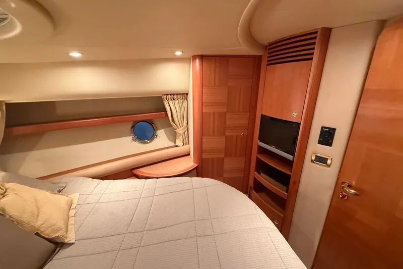 Slide: The Image of Luxurious cabin interior of 2008 Azimut 55 EVOLUTION yacht with cozy bed and TV. - 39