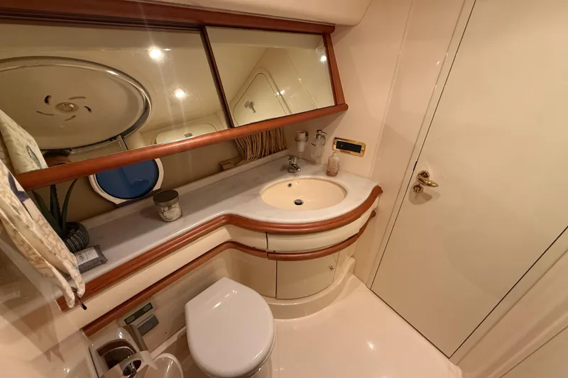 Slide: The Image of Luxurious bathroom in 2008 Azimut 55 EVOLUTION yacht with elegant fixtures and mirror. - 41