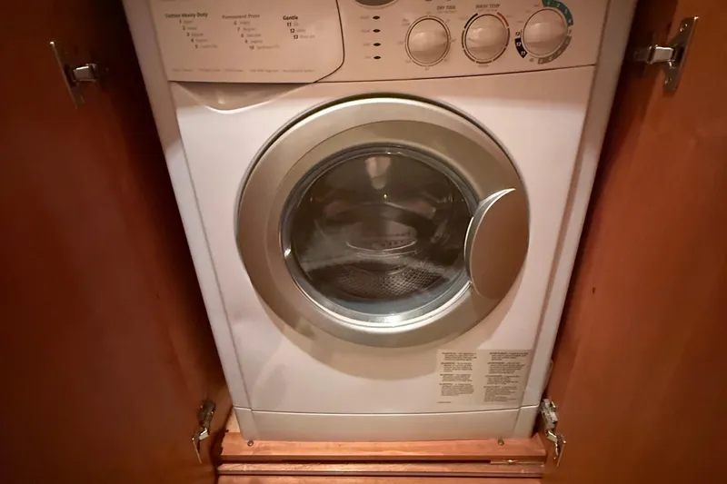 Slide: The Image of Front-loading washing machine in wooden cabinet on Azimut 55 EVOLUTION yacht, 2008 model. - 46