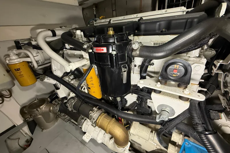 Slide: The Image of Engine room of 2008 Azimut 55 EVOLUTION yacht, showcasing detailed mechanical components. - 48