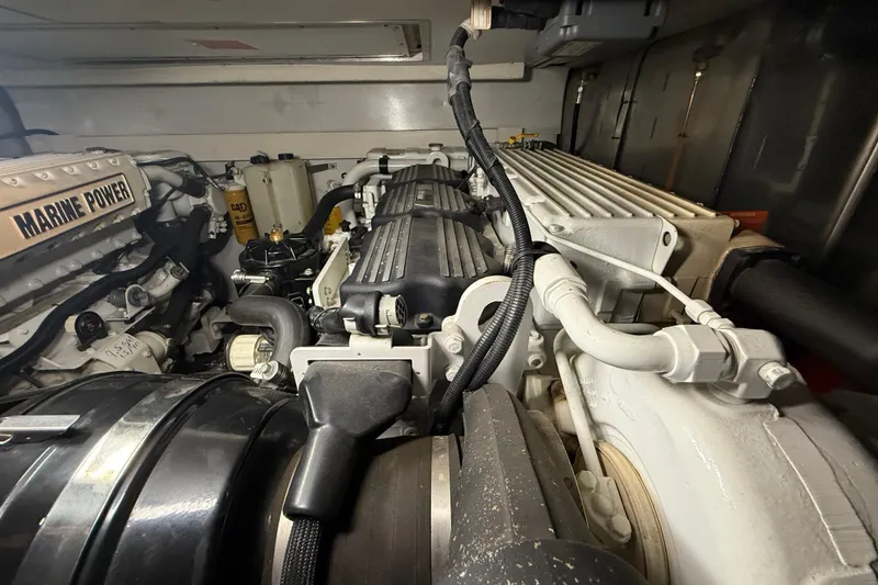 Slide: The Image of Engine room of 2008 Azimut 55 EVOLUTION yacht, showcasing Marine Power components. - 49