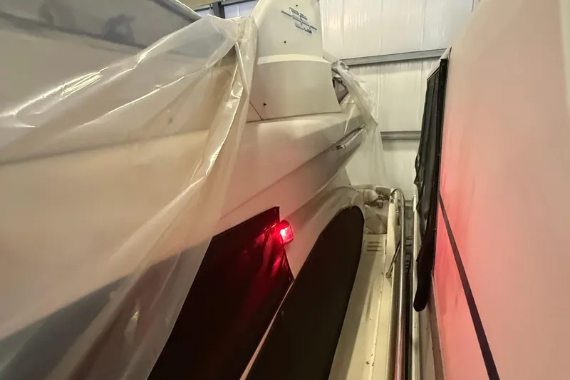 Slide: The Image of 2008 Azimut 55 EVOLUTION yacht in storage, covered with protective plastic. - 5
