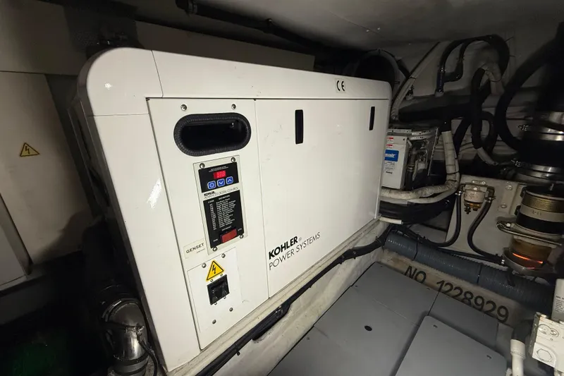Slide: The Image of Engine room of 2008 Azimut 55 EVOLUTION yacht with Kohler power systems generator. - 53