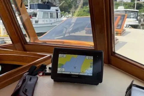 Slide: The Image of Boat cockpit with navigation system, Custom Gannon & Benjamin model, 2005, docked at marina. - 12