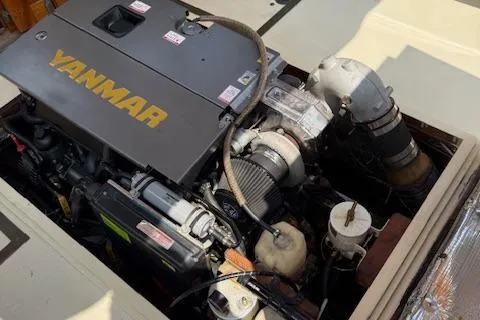 Slide: The Image of Engine compartment of a 2005 Custom Gannon & Benjamin boat with Yanmar engine. - 24