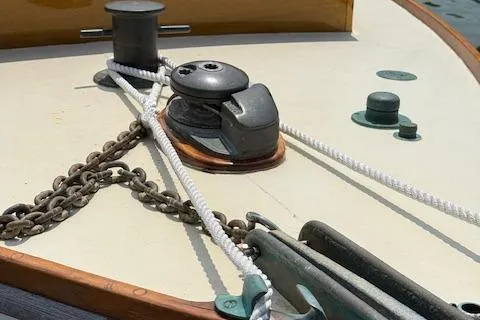 Slide: The Image of Custom Gannon & Benjamin 2005 boat deck with winch, ropes, and chain detail. - 5