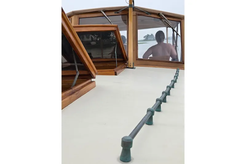 Slide: The Image of Custom Gannon & Benjamin boat interior with wooden windows, 2005 model. - 6