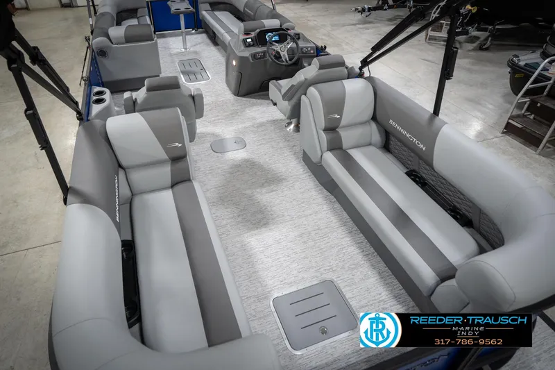 Slide: The Image of 2026 Bennington 25 SSR pontoon boat interior with gray seating and modern design. - 15