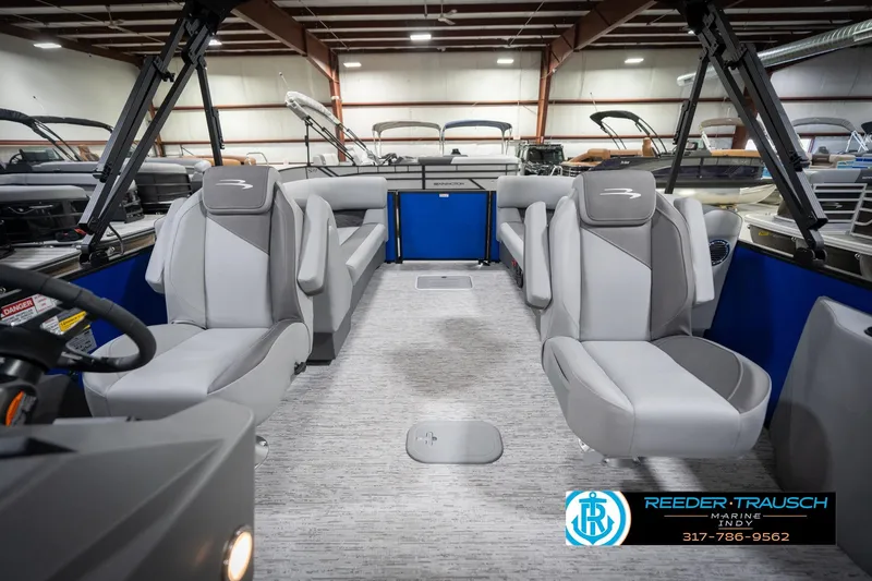 Slide: The Image of Interior of 2026 Bennington 25 SSR boat with modern seating and sleek design. - 17