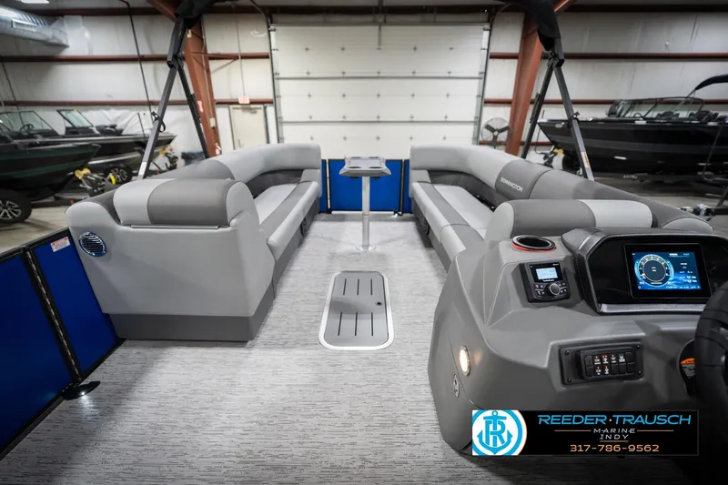 Slide: The Image of 2026 Bennington 25 SSR pontoon boat interior with modern seating and control panel. - 20