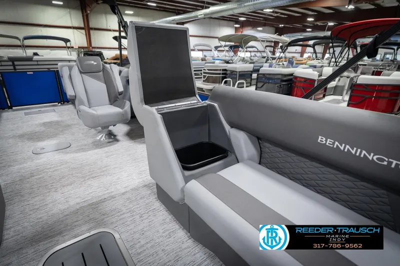 Slide: The Image of 2026 Bennington 25 SSR pontoon boat interior with seating and storage features. - 25