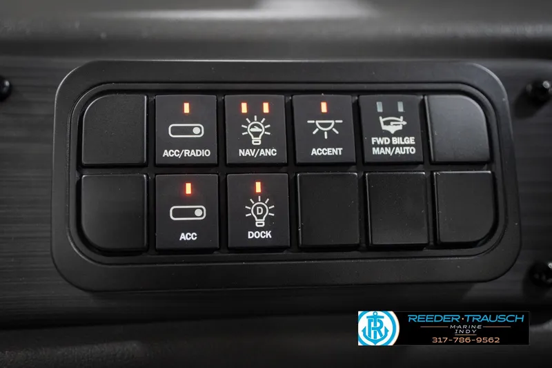 Slide: The Image of Control panel of 2026 Bennington 25 SSR boat with various function switches. - 33