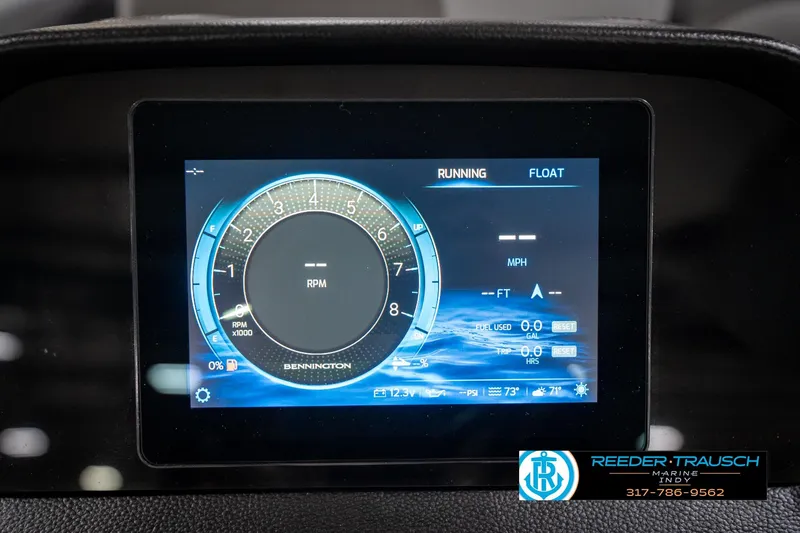 Slide: The Image of 2026 Bennington 25 SSR dashboard display showing RPM and navigation details. - 35