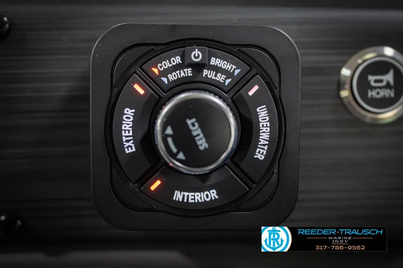 Slide: The Image of Control panel of 2026 Bennington 25 SSR boat with lighting options and horn button. - 37