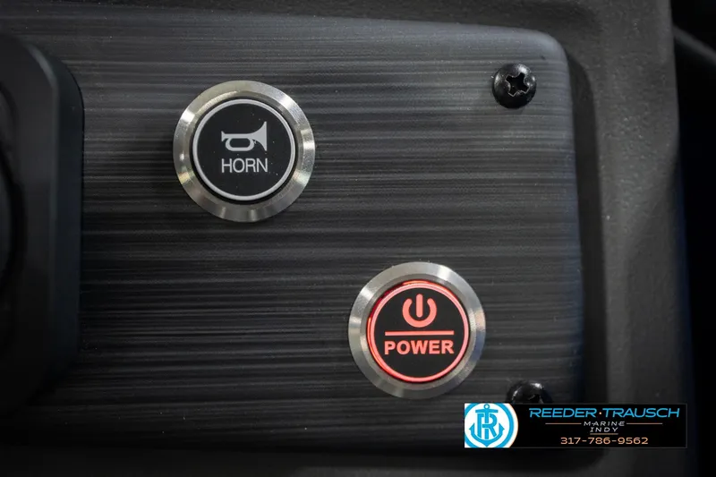 Slide: The Image of Close-up of 2026 Bennington 25 SSR horn and power buttons on dashboard. - 38