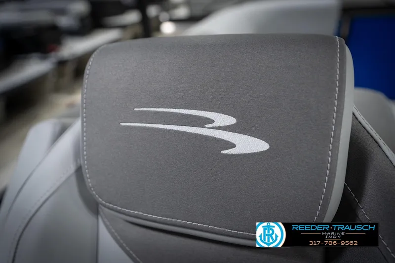 Slide: The Image of Gray seat with Bennington logo on 2026 Bennington 25 SSR boat, Reeder Trausch Marine branding. - 41