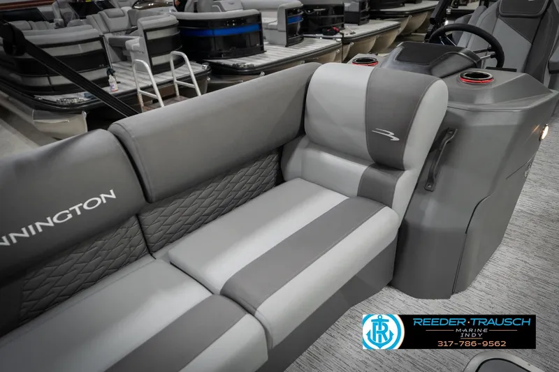 Slide: The Image of 2026 Bennington 25 SSR pontoon boat interior with gray seating and console. - 43