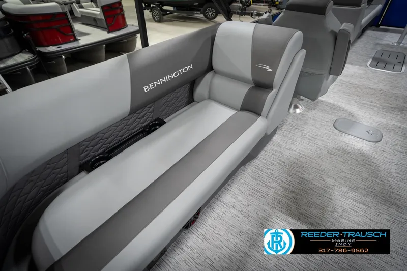 Slide: The Image of 2026 Bennington 25 SSR boat interior with gray seating and logo. - 44