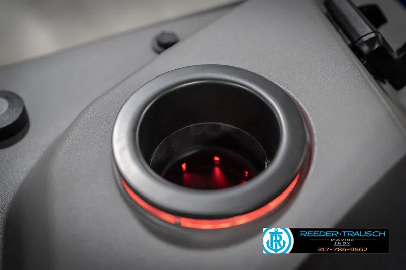 Slide: The Image of Close-up of a 2026 Bennington 25 SSR cup holder with red LED lighting. - 46