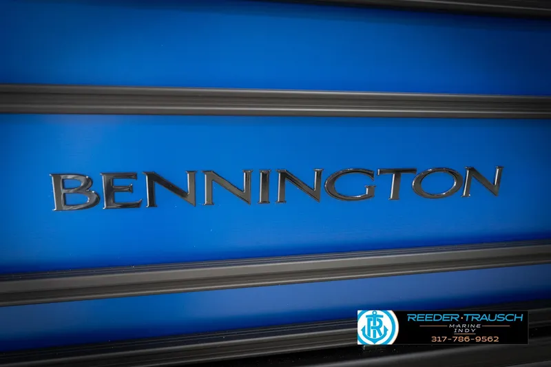 Slide: The Image of 2026 Bennington 25 SSR boat logo on blue background, Reeder-Trausch Marine branding. - 50