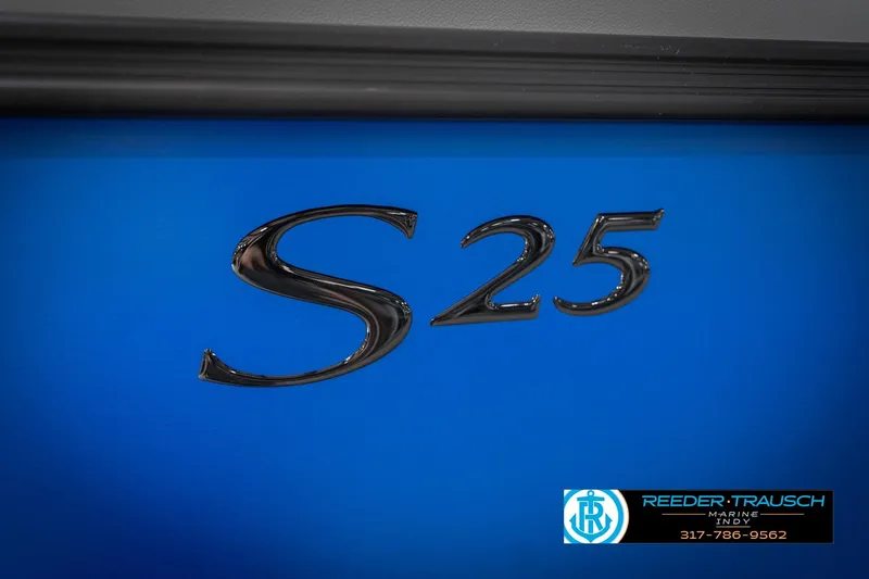 Slide: The Image of 2026 Bennington 25 SSR boat emblem on blue background, Reeder-Trausch Marine logo visible. - 51