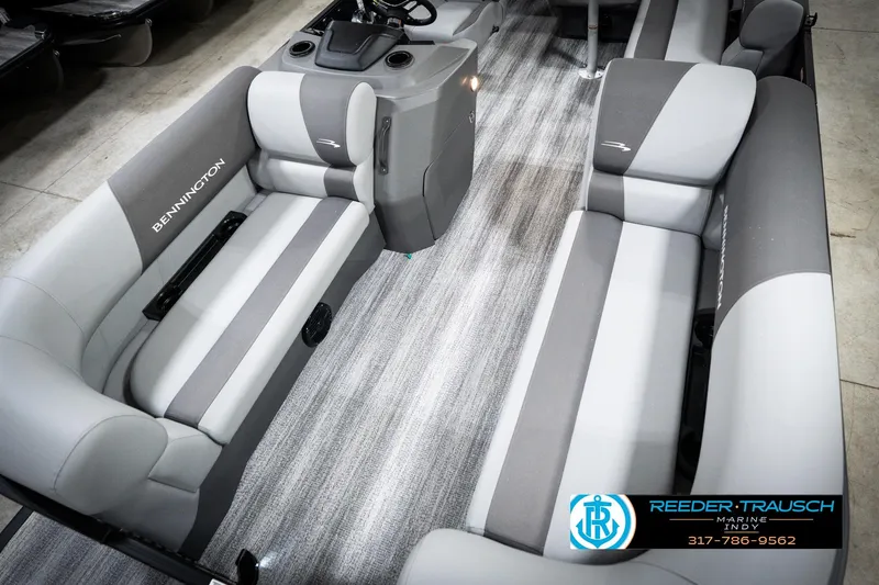 Slide: The Image of 2026 Bennington 188 SLJ pontoon boat interior with plush seating and modern helm. - 12