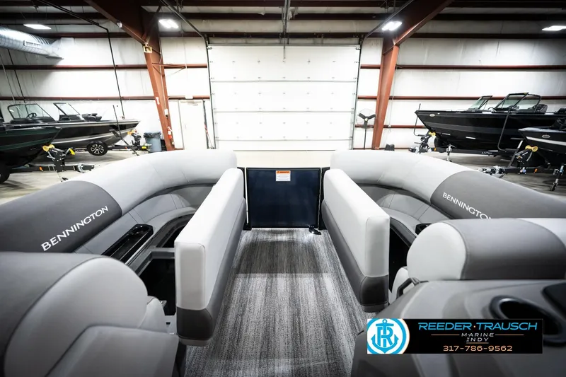 Slide: The Image of 2026 Bennington 188 SLJ pontoon boat interior with seating and storage. - 20
