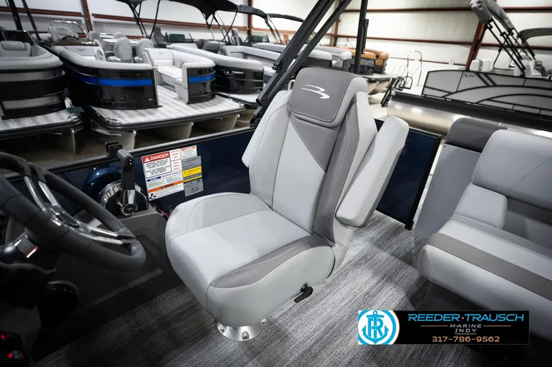 Slide: The Image of 2026 Bennington 188 SLJ boat interior with gray seating and modern design. - 27