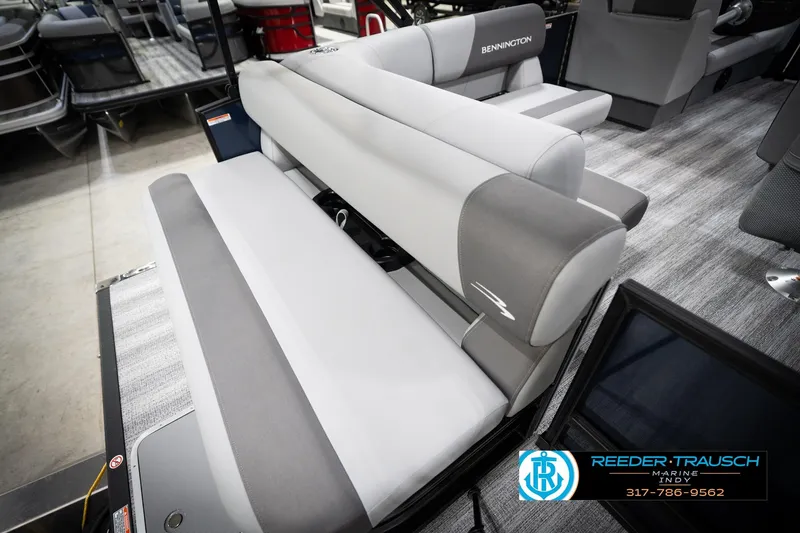 Slide: The Image of 2026 Bennington 188 SLJ boat interior with steering wheel and control panel. - 29