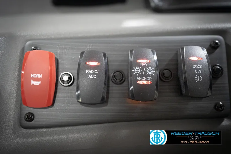 Slide: The Image of Dashboard of 2026 Bennington 188 SLJ with RPM, trim, and fuel gauges. - 34