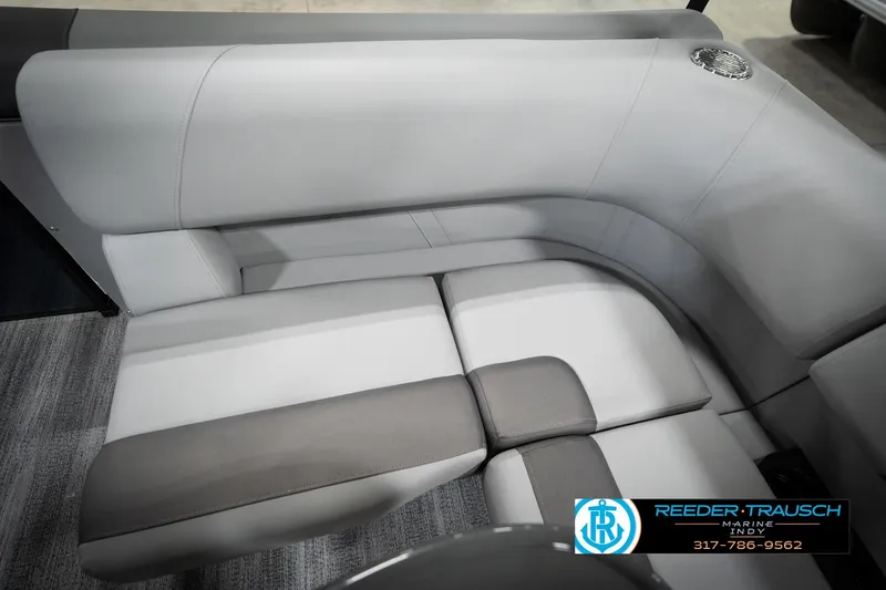 Slide: The Image of 2026 Bennington 188 SLJ boat interior with gray seating and steering console. - 42