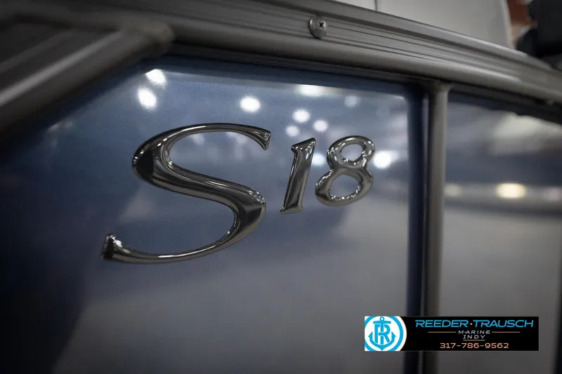 Slide: The Image of 2026 Bennington 188 SLJ pontoon boat interior with seating, showcased at Reeder-Trausch Marine. - 51