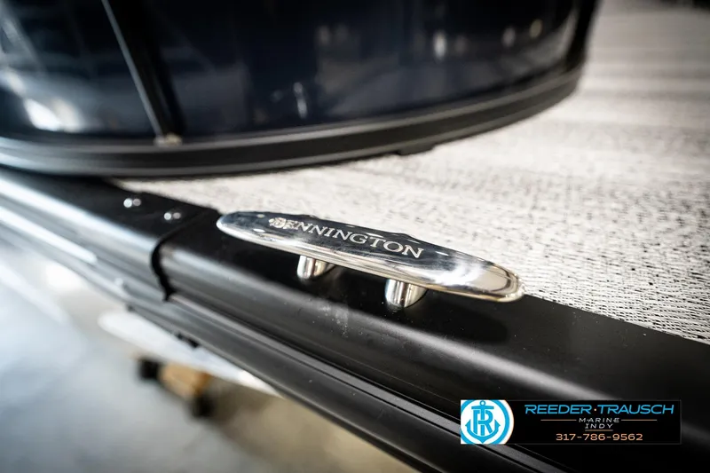 Slide: The Image of 2026 Bennington 188 SLJ boat cleat detail with Reeder-Trausch Marine logo. - 54