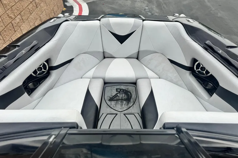 Slide: The Image of 2015 Centurion Enzo FS44 boat interior with sleek, modern seating and stylish design. - 10