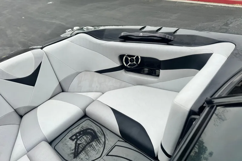 Slide: The Image of 2015 Centurion Enzo FS44 boat interior with sleek, modern seating design. - 12