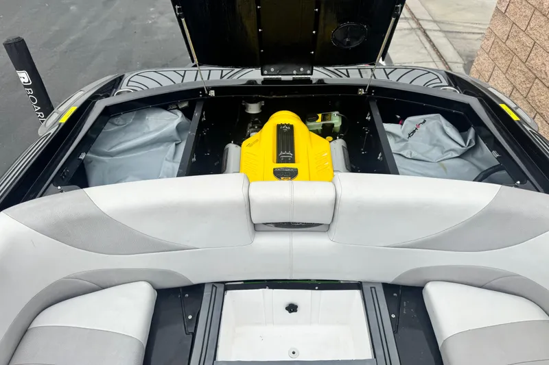 Slide: The Image of 2015 Centurion Enzo FS44 boat engine compartment with yellow engine cover. - 26