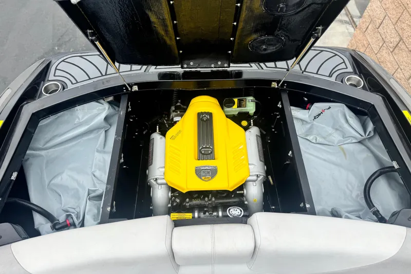 Slide: The Image of 2015 Centurion Enzo FS44 engine compartment with yellow engine cover. - 27