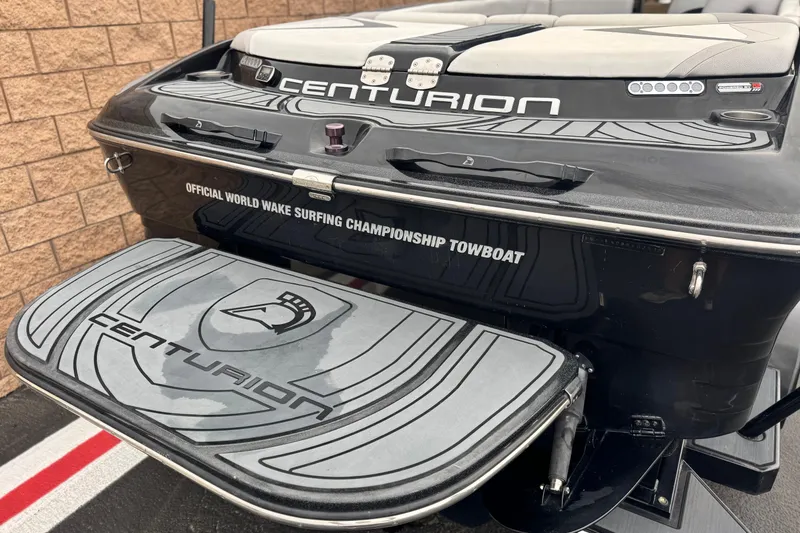 Slide: The Image of 2015 Centurion Enzo FS44 wake surfing championship towboat, rear view with branding. - 7