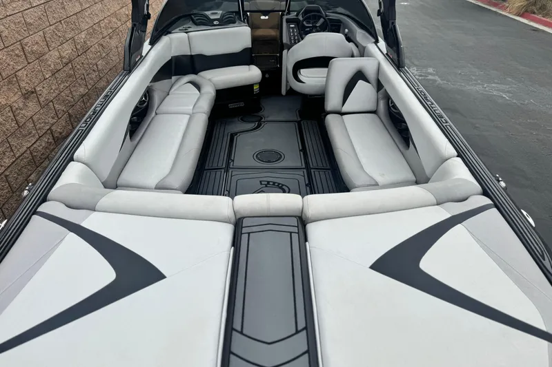 Slide: The Image of 2015 Centurion Enzo FS44 boat interior with spacious seating and modern design. - 8