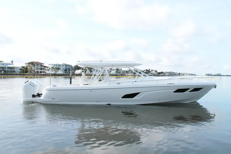 The Image of 2024 Intrepid 41 Valor boat on calm water, showcasing sleek design and modern features. - 0