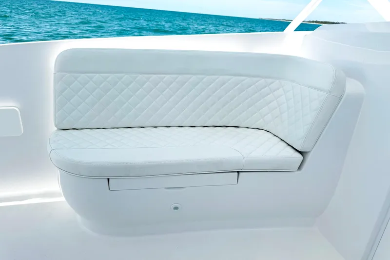 Slide: The Image of Luxurious white seating on 2024 Intrepid 41 Valor boat with ocean view. - 23